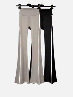 beige and black flared pants with white side stripes