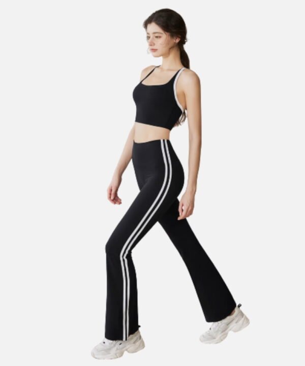 black halter crop top and flared stripe pants