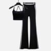 black ribbed flare yoga pants and strappy crop top