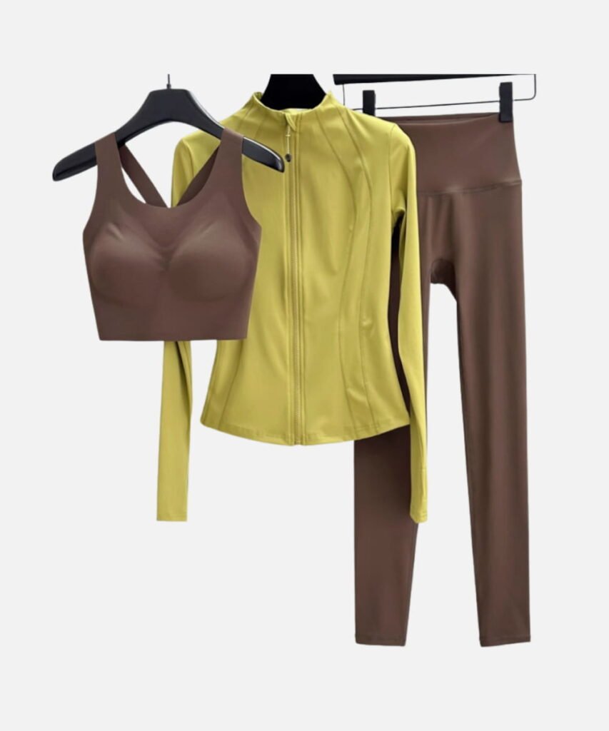 brown sports bra with yellow zip jacket and brown leggings
