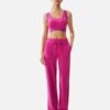 fuchsia crossback sports bra with blue trim and pants