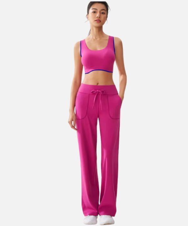 fuchsia crossback sports bra with blue trim and pants