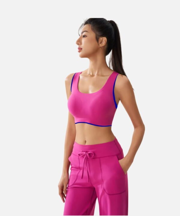 fuchsia sports bra with blue trim and drawstring pants