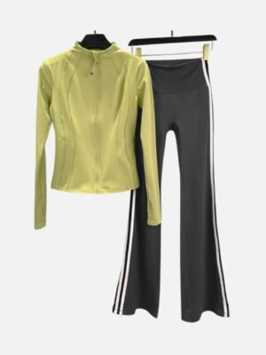 light green zip jacket and dark gray flared pants