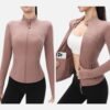 mauve zip up jacket with thumbholes and inner pocket