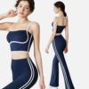navy crop top and flare pants with white side stripes