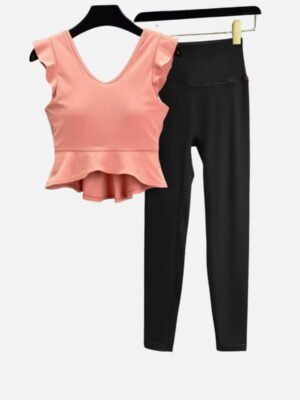 Peach ruffle crop top and black highwaist leggings