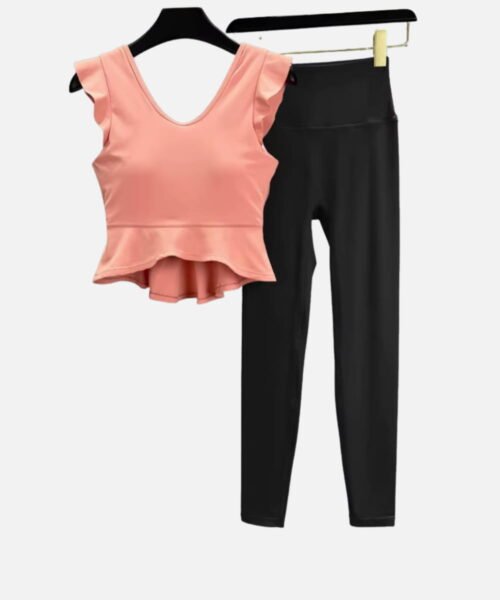 Peach ruffle crop top and black highwaist leggings