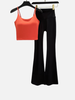 Red crop top with black flared yoga pants