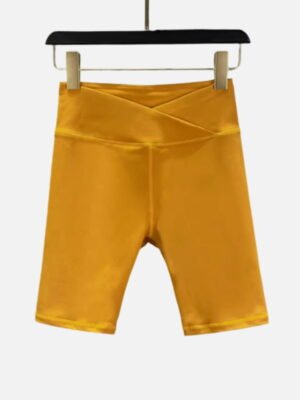 yellow high waist biker shorts with crossover waistband