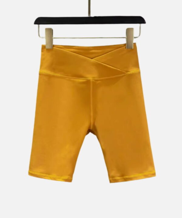 yellow high waist biker shorts with crossover waistband