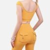 yellow off shoulder crop top and biker shorts