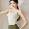 Cream scoop neck crop top in soft fabric, perfect for minimalist everyday styling