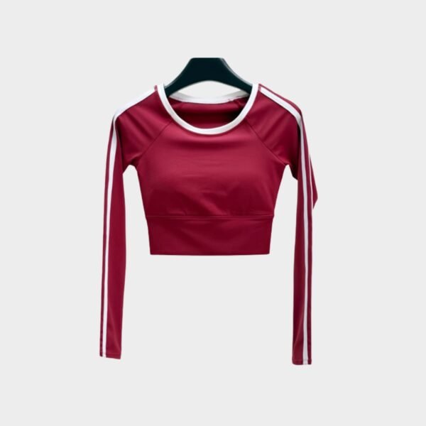 Red cropped long sleeve top with white contrast trim, sleek gym outfit