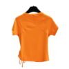 Back view of bright orange gym top with curved stitch design and short sleeves