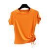 Bright orange gym top with side drawstring adjustment, ideal for active summer sessions