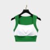 Green and white gym bra with square neckline and colorblock style, ideal for training sessions