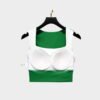 Inside view of green and white sports bra with padded cups for added support and comfort