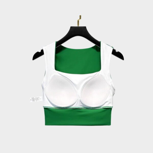 Inside view of green and white sports bra with padded cups for added support and comfort