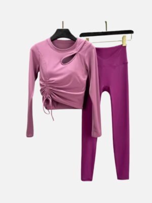 Mauve padded cutout yoga top with side ruching, matched with magenta leggings for training or casual
