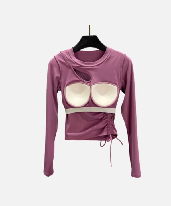 Mauve padded cutout yoga top with side ruching, matched with magenta leggings for training or casual