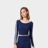 Navy blue fitted crop top with long sleeves and stripe detail for athletic wear