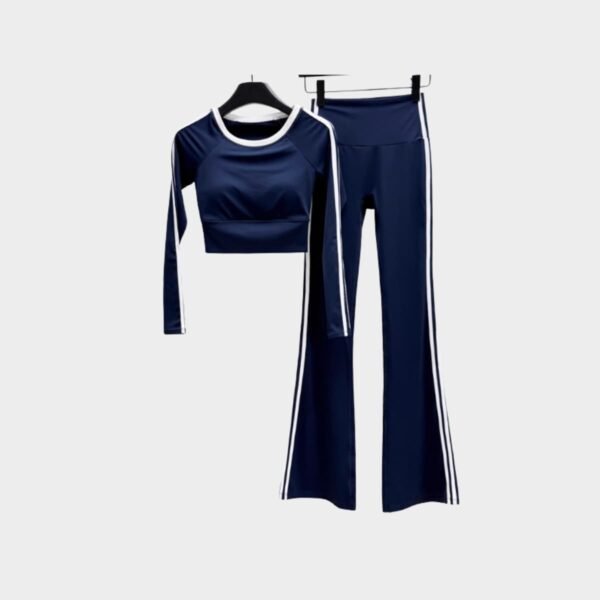 Navy blue crop top with matching striped flared pants, perfect for fitness or casual wear