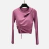 Lavender cutout long sleeve active top with ruched waist and breathable fabric