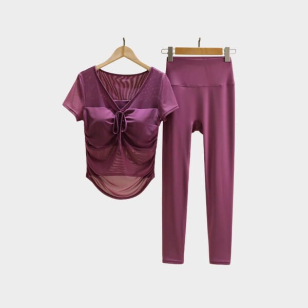 Purple yoga set with ruched mesh short-sleeve top and slim-fit leggings
