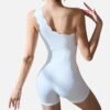 White asymmetric scalloped romper for a modern statement in minimal activewear