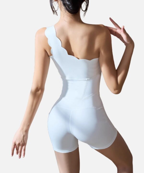 White asymmetric scalloped romper for a modern statement in minimal activewear
